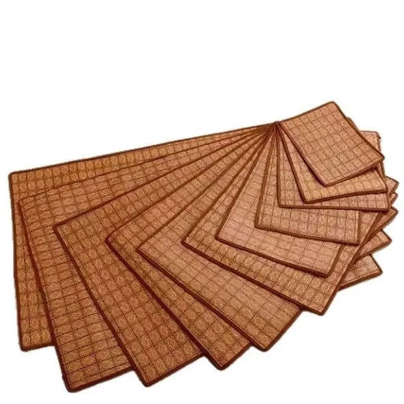 Brown rattan fibre cooling mat for dogs in large size, laid flat on a wooden floor.