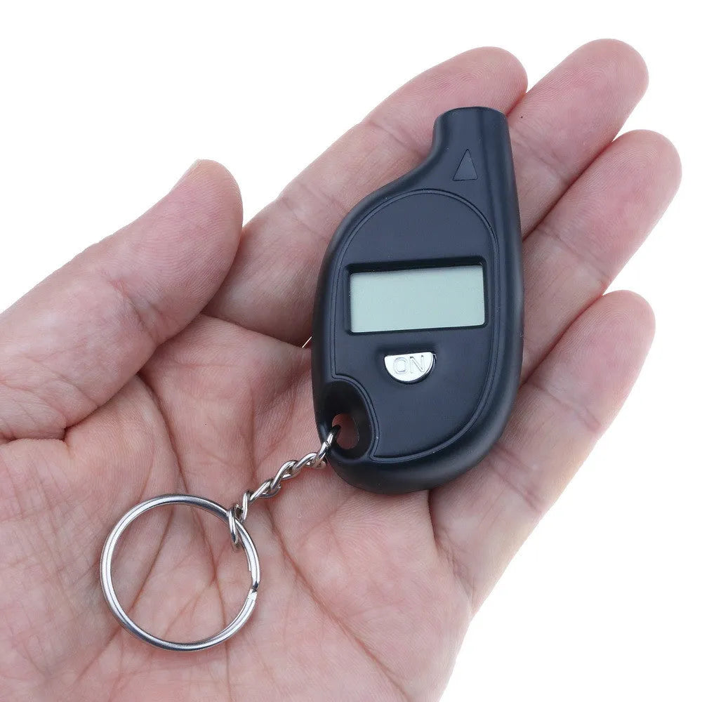 Black ABS keychain tire pressure gauge with LCD screen on keyring