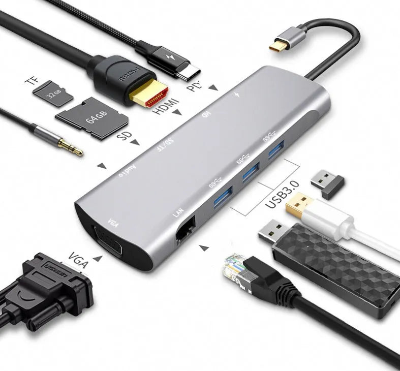 Grey aluminium USB-C docking station showing HDMI, VGA, USB 3.0, PD charging, and card reader ports.