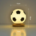 Football LED small glass night lamp with black and white football design on bedside table, USB powered, remote controlled