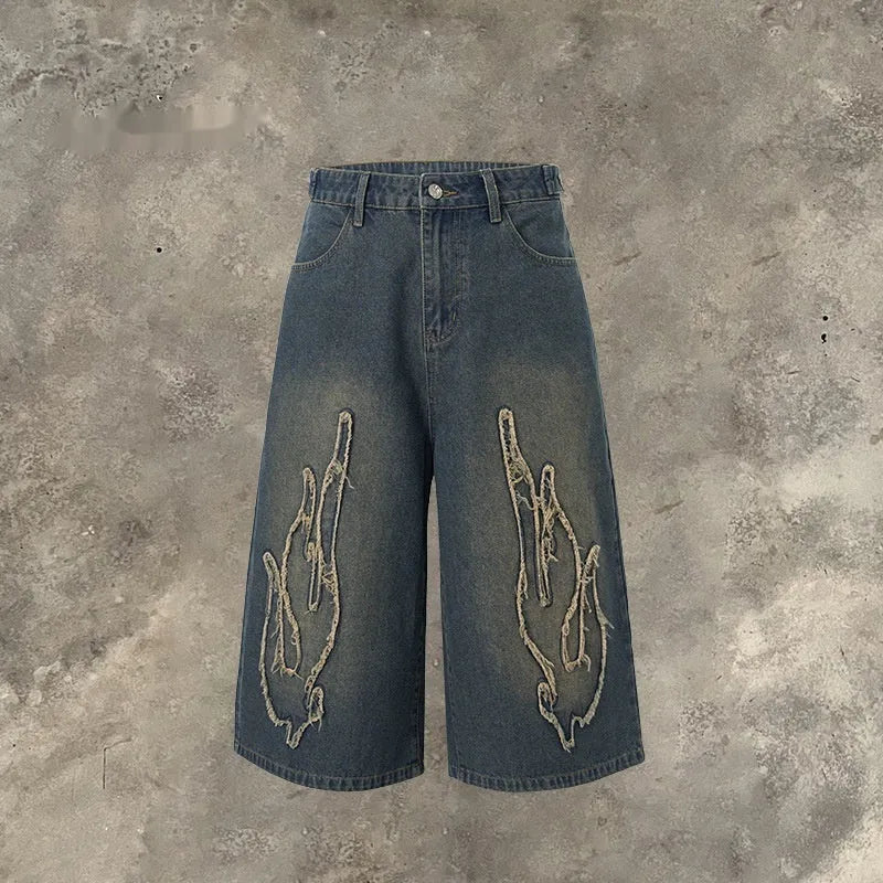 Men's black cropped denim shorts with flame embroidery patch on straight leg summer shorts
