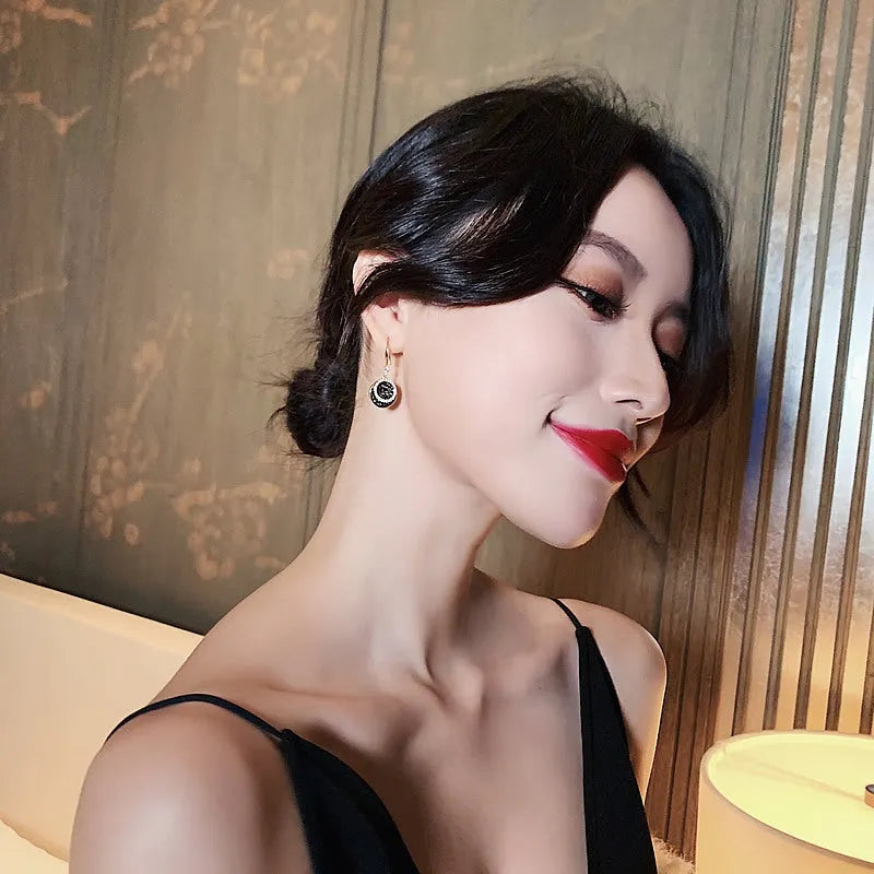 Black geometric round alloy earrings with retro Hong Kong style, measuring 3.6cm in length.