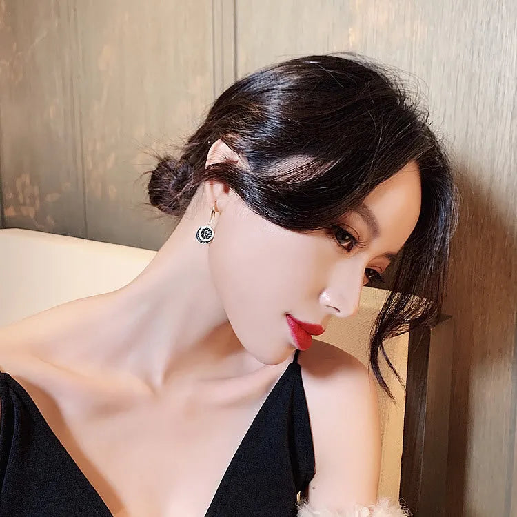 Black geometric round alloy earrings with retro Hong Kong style, measuring 3.6cm in length.