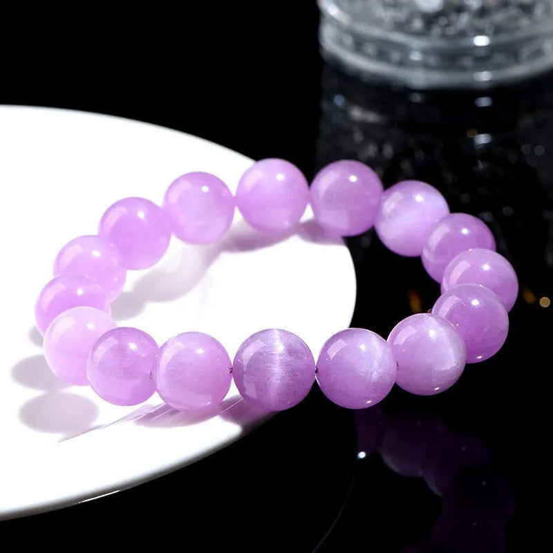 Natural cat's eye spodumene purple bracelet with waxy polished geometric beads