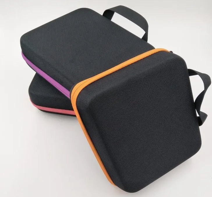Red EVA essential oil storage bag with 30 compartments for 15ml bottles, shown hanging on a wall.