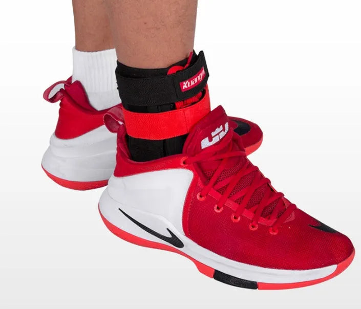 Kuangmi adjustable ankle brace in black red with straps for sport support