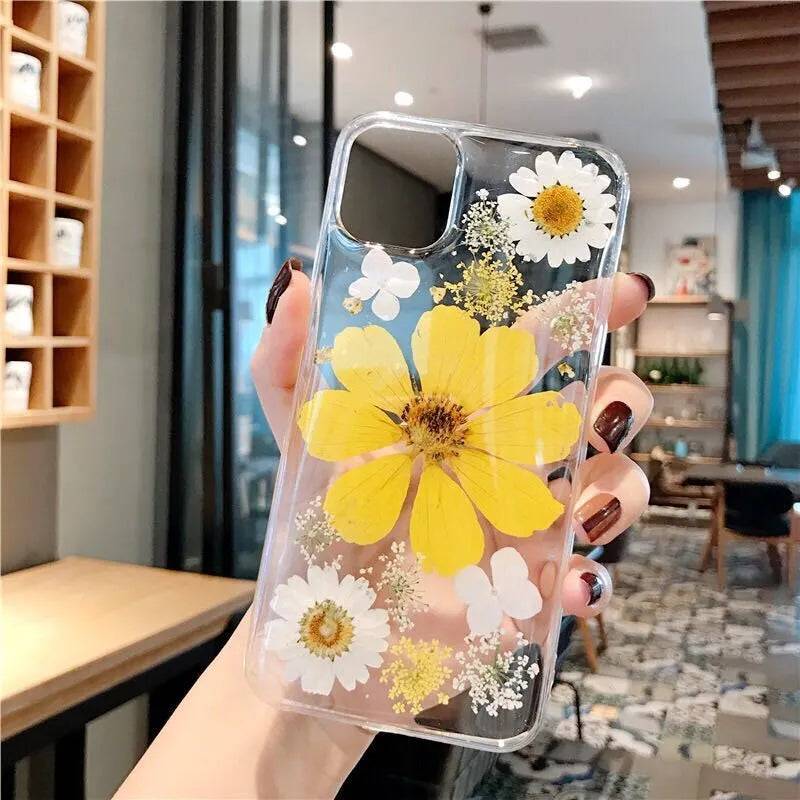 Pink floral pattern TPU back cover case for iPhone on a white background.