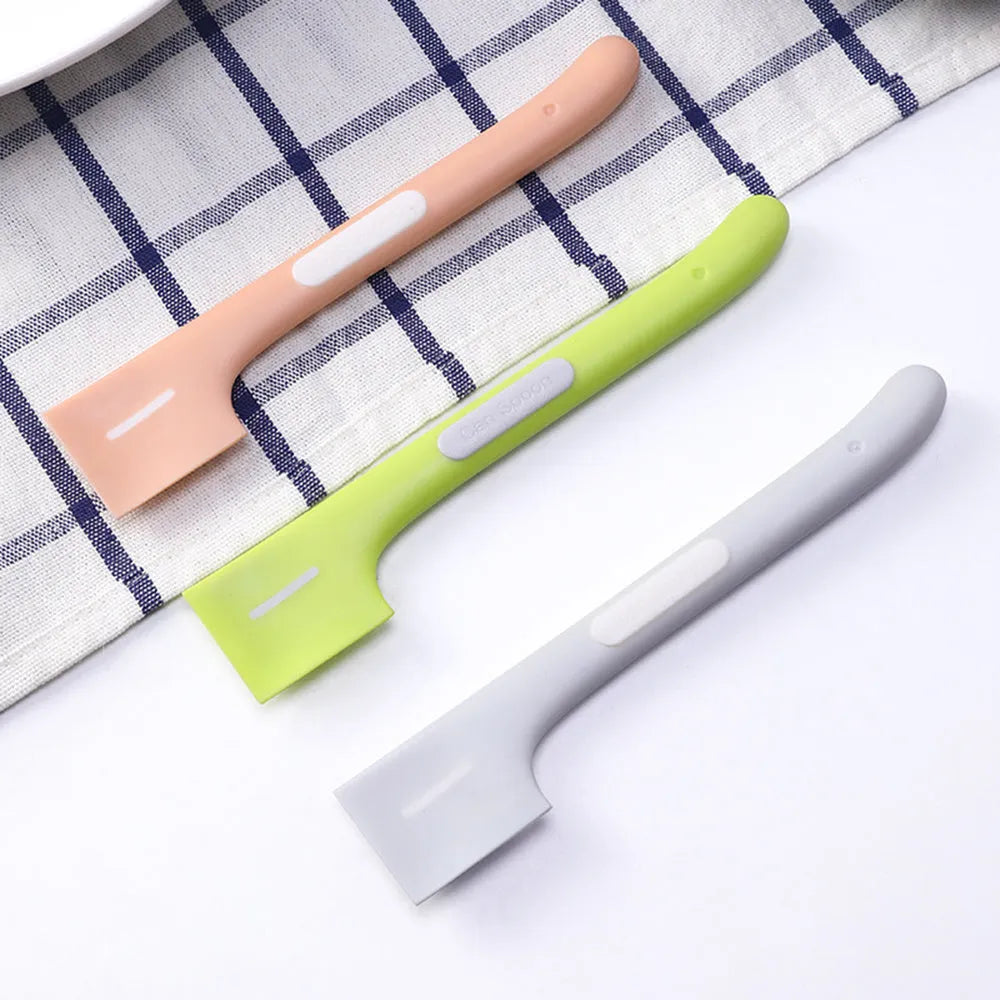 Green, pink, and purple long-handle TPR spoons for scooping canned wet food for cats and dogs.