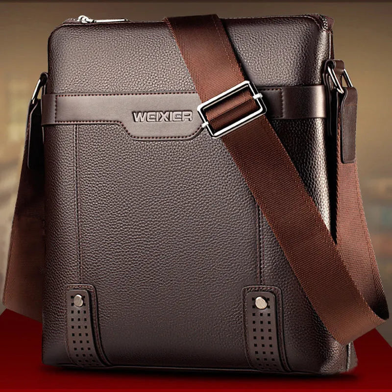 Men's PU leather messenger bag in black with zipper closure, soft body, and crossbody strap.