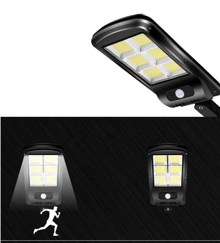 Black solar powered outdoor motion sensor light with solar panel for garden fence or driveway illumination