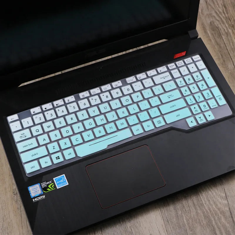 ASUS Flight laptop keyboard protective film cover in various colour options including blue, mint, and gradient patterns.