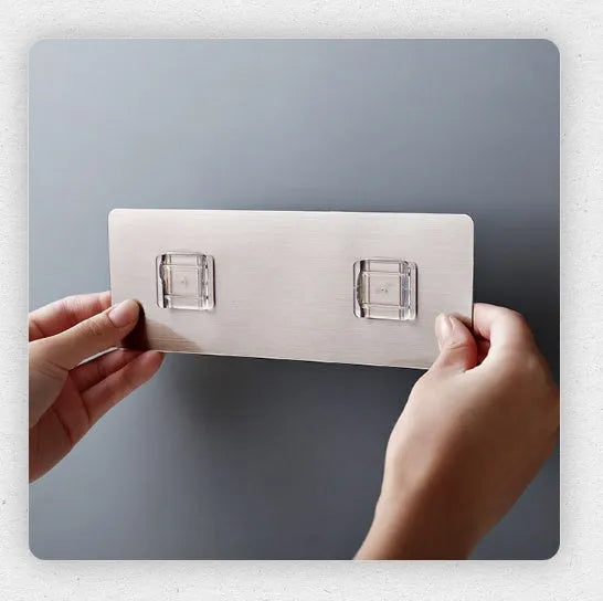White plastic kitchen knife rack with modern simple design on countertop holding several knives