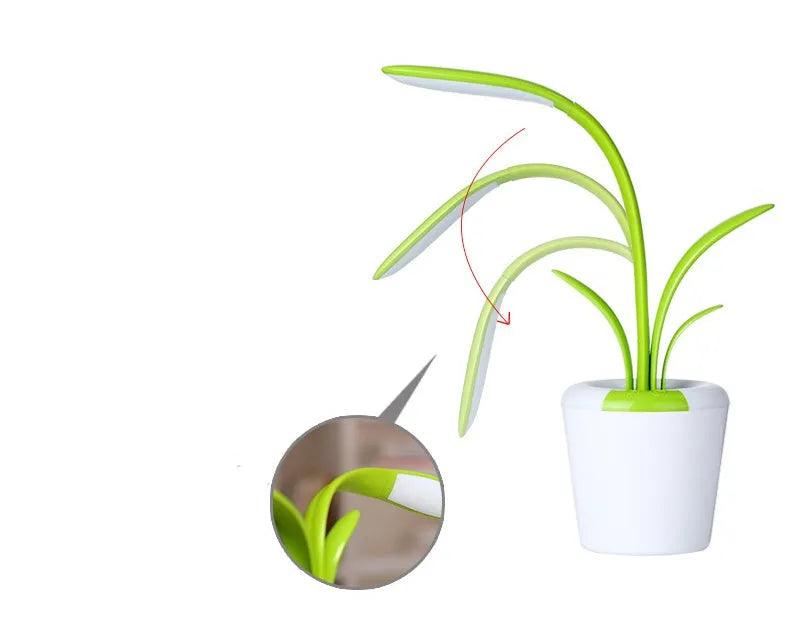 Modern rechargeable LED table lamp in blue with stylised plant shape on end table