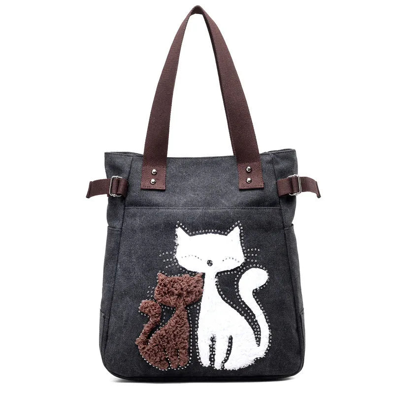 KVKY women canvas shoulder bag with cute plush cat applique in beige colour on white background