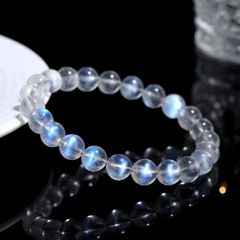 Natural cream body blue moonlight crystal bracelet with smooth ground beads in unisex simple design