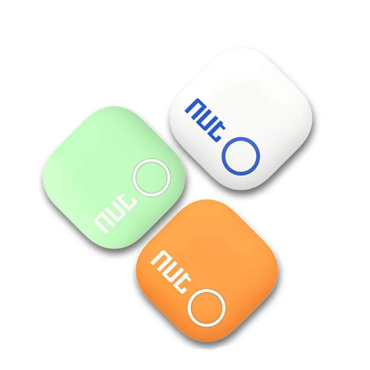 NUT2 generation anti-lost device in white, showing compact 36x36x5.8mm size and keyring attachment
