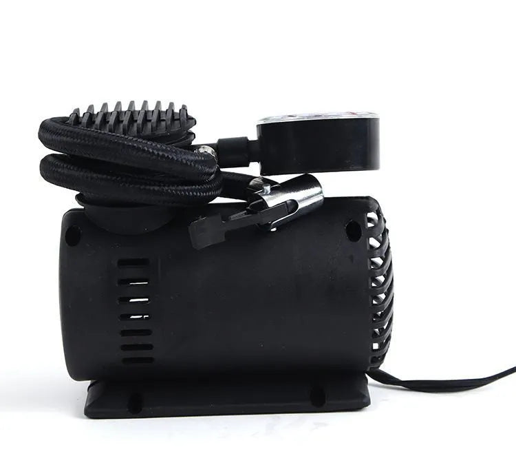 Black 12V portable mini air compressor with 300 psi gauge, 9-foot cord, and two adapter nozzles on a neutral background