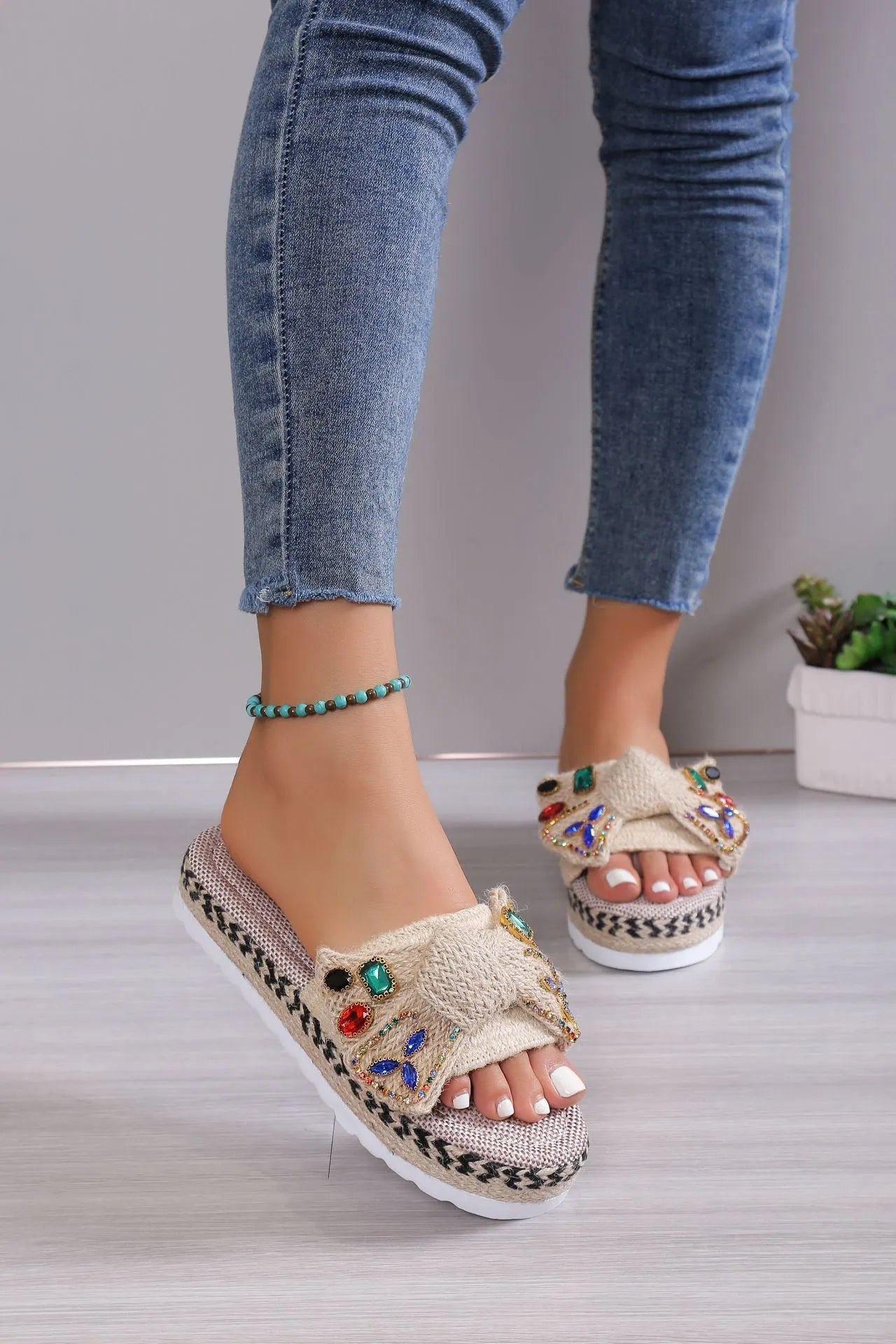 Women's beige platform sandals with bow detail, round toe and cloth upper, side view