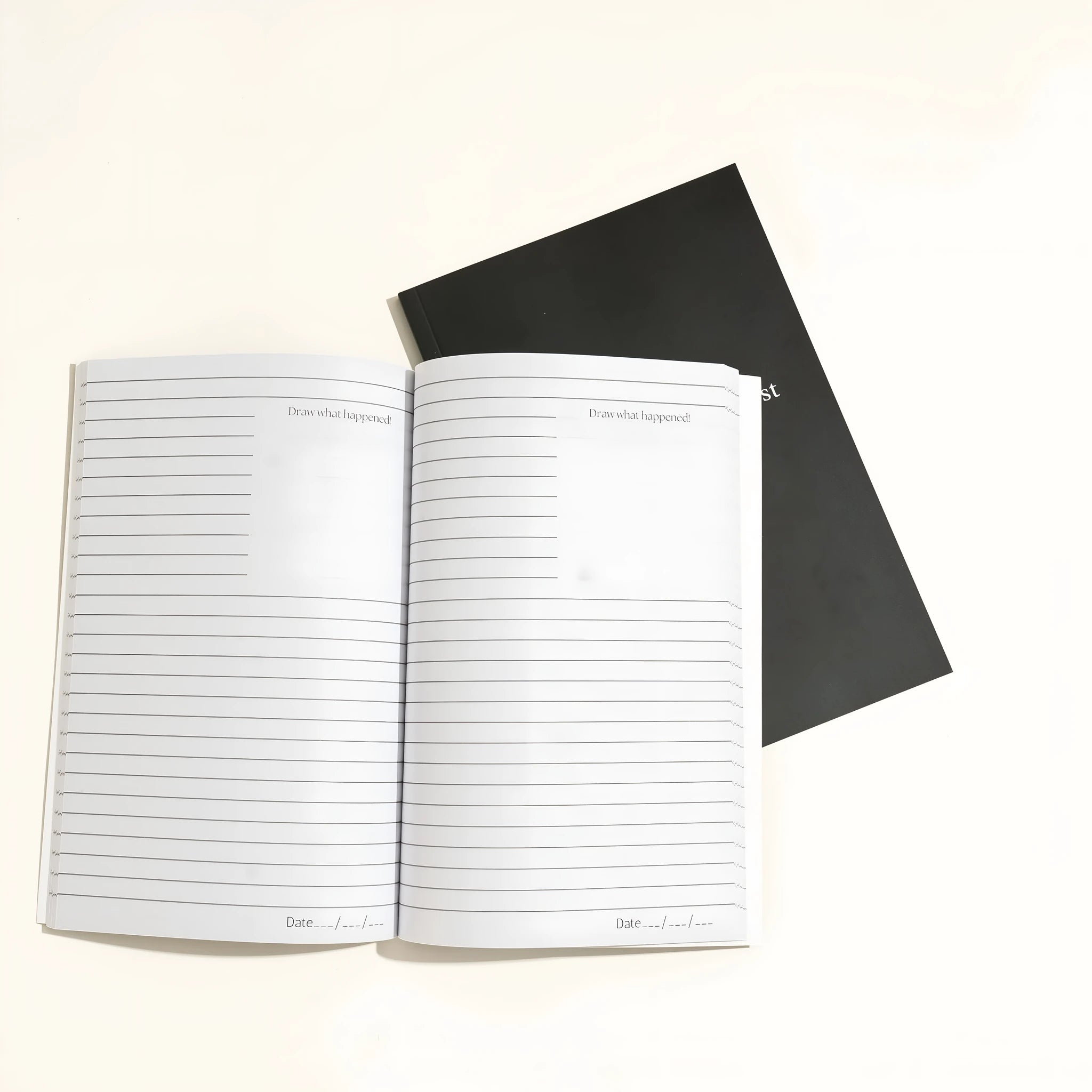 Black A5 dream journal notebook with gold lettering and two ribbon markers