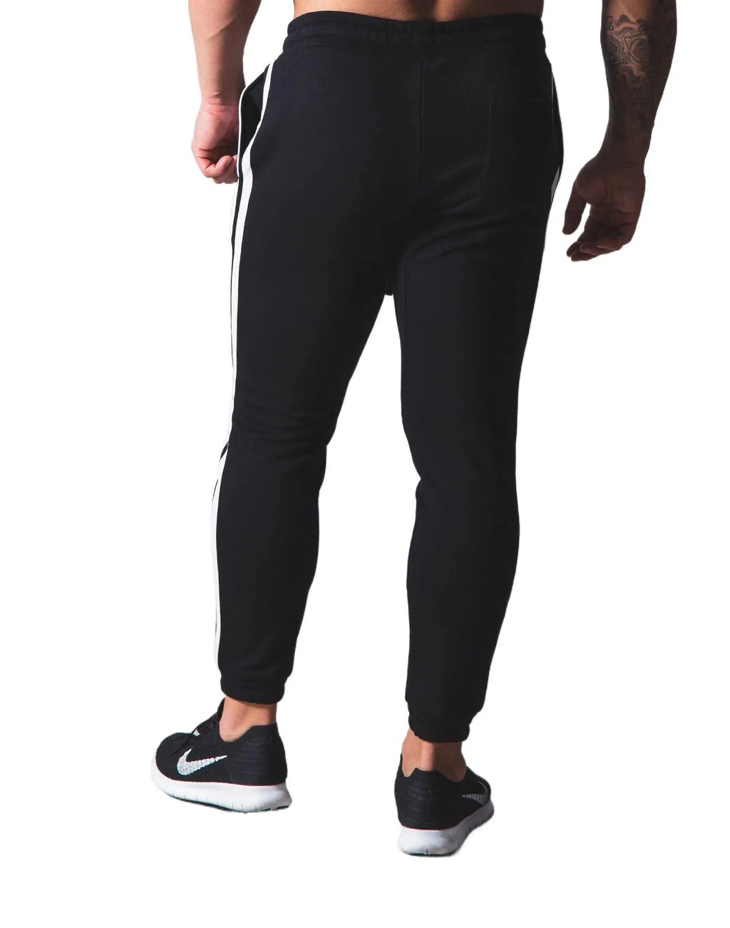 New Muscle Brother cotton sports trousers in black, 95 percent cotton, elastic waist, side view on model