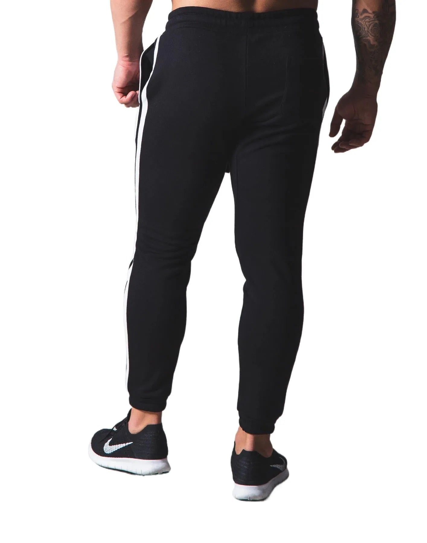 New Muscle Brother cotton sports trousers in black, 95 percent cotton, elastic waist, side view on model