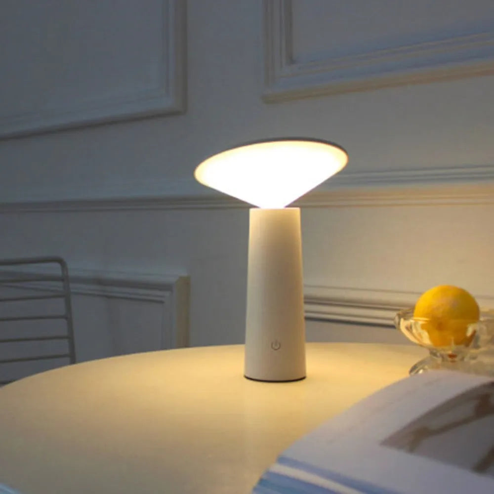 Black or white USB rechargeable table lamp with touch sensor and adjustable LED head.