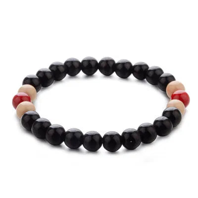 Natural lava stone essential oil diffuser bracelet with ethnic beads measuring 18cm