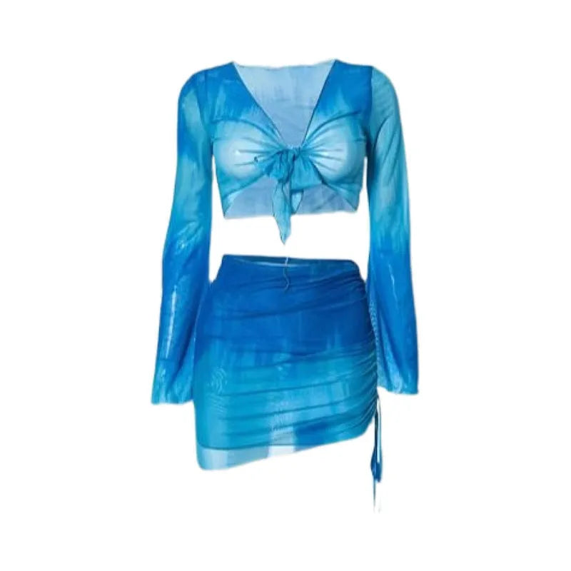 Women's blue four-piece bikini swimsuit set with high-waist briefs and ruffle skirt