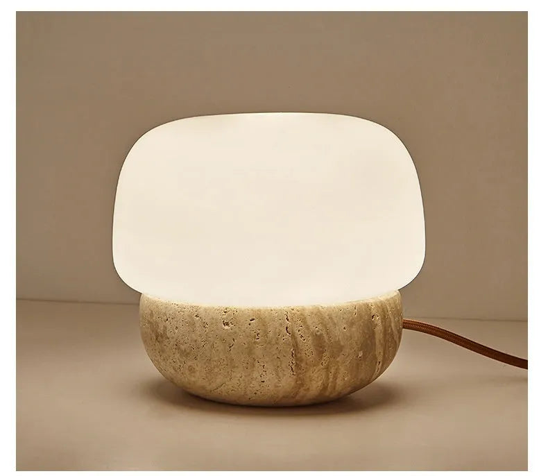 Cream retro bedside lamp with button switch measuring 18cm by 17cm on wooden table