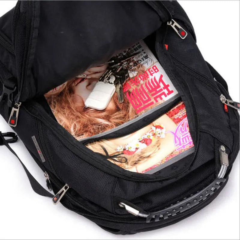 Black business computer backpack showing multiple compartments and organisational pockets for laptop carry.