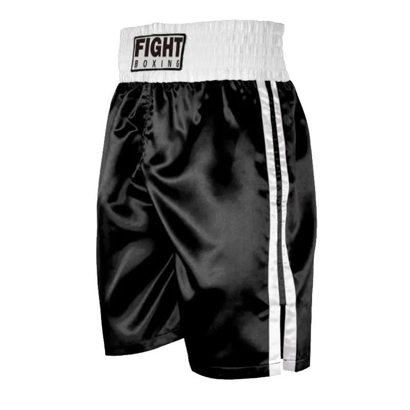 Black and white striped boxing shorts with elastic waistband and side slits for kickboxing training.