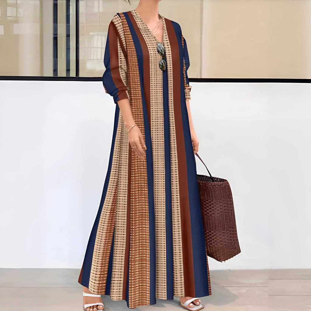 Camel coloured women's vertical striped V-neck long dress with long sleeves and an A-line skirt.