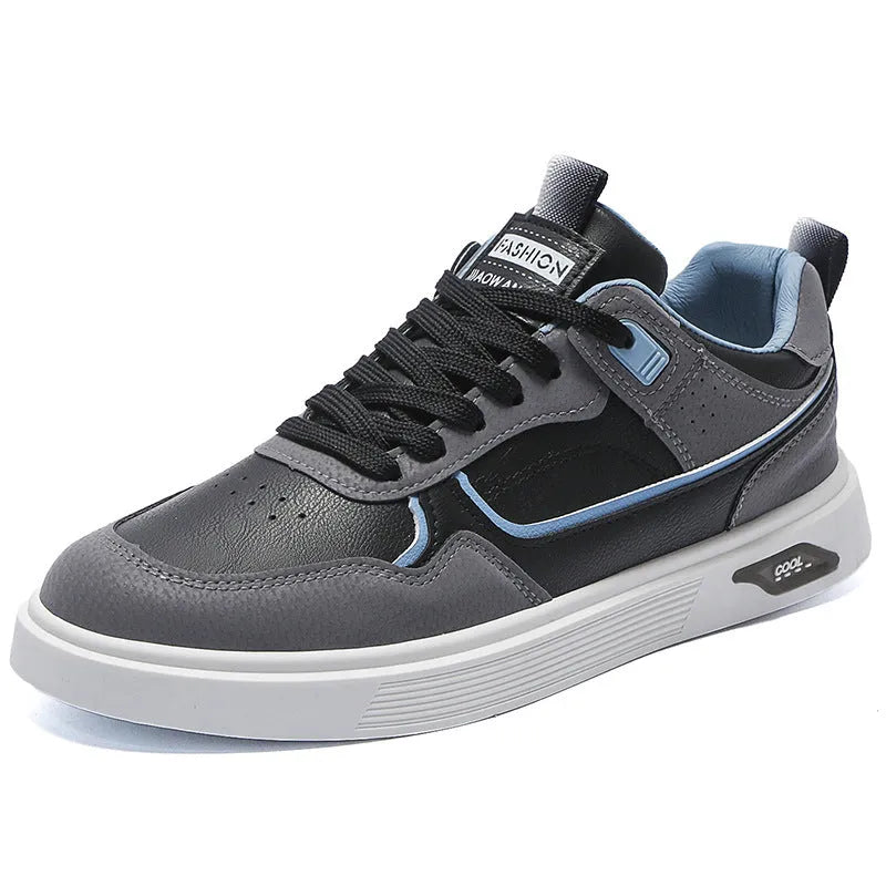 Men's low-top canvas board shoes in solid colour with leather stitching detail on a neutral background.