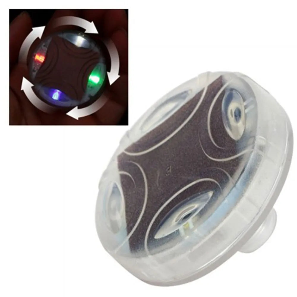Solar car wheel decoration lights with red, green, and blue LEDs installed on a car wheel hub at night