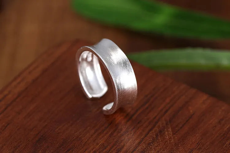 Adjustable open ring with geometric shape in frosted sterling silver with electroplated finish