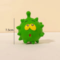 Four colourful latex squeaky dog balls with bumpy texture and cute faces for dental cleaning during play