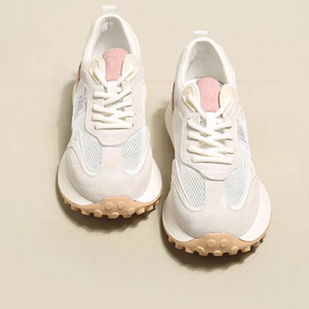 Women's grey and pink retro sneaker with low-top design and rubber sole