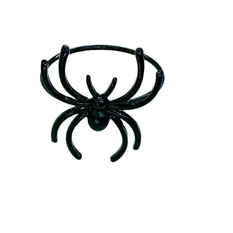 Six black spider-shaped alloy metal napkin rings for Halloween table decoration