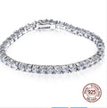 S925 silver bracelet with micro inlay floral leaf chain design on neutral background