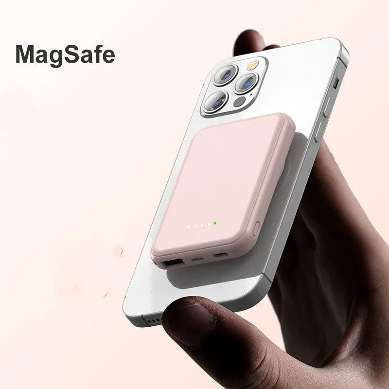 Mini magnetic wireless power bank 5000mAh with LED display and AI cooling in cool black colour on a table