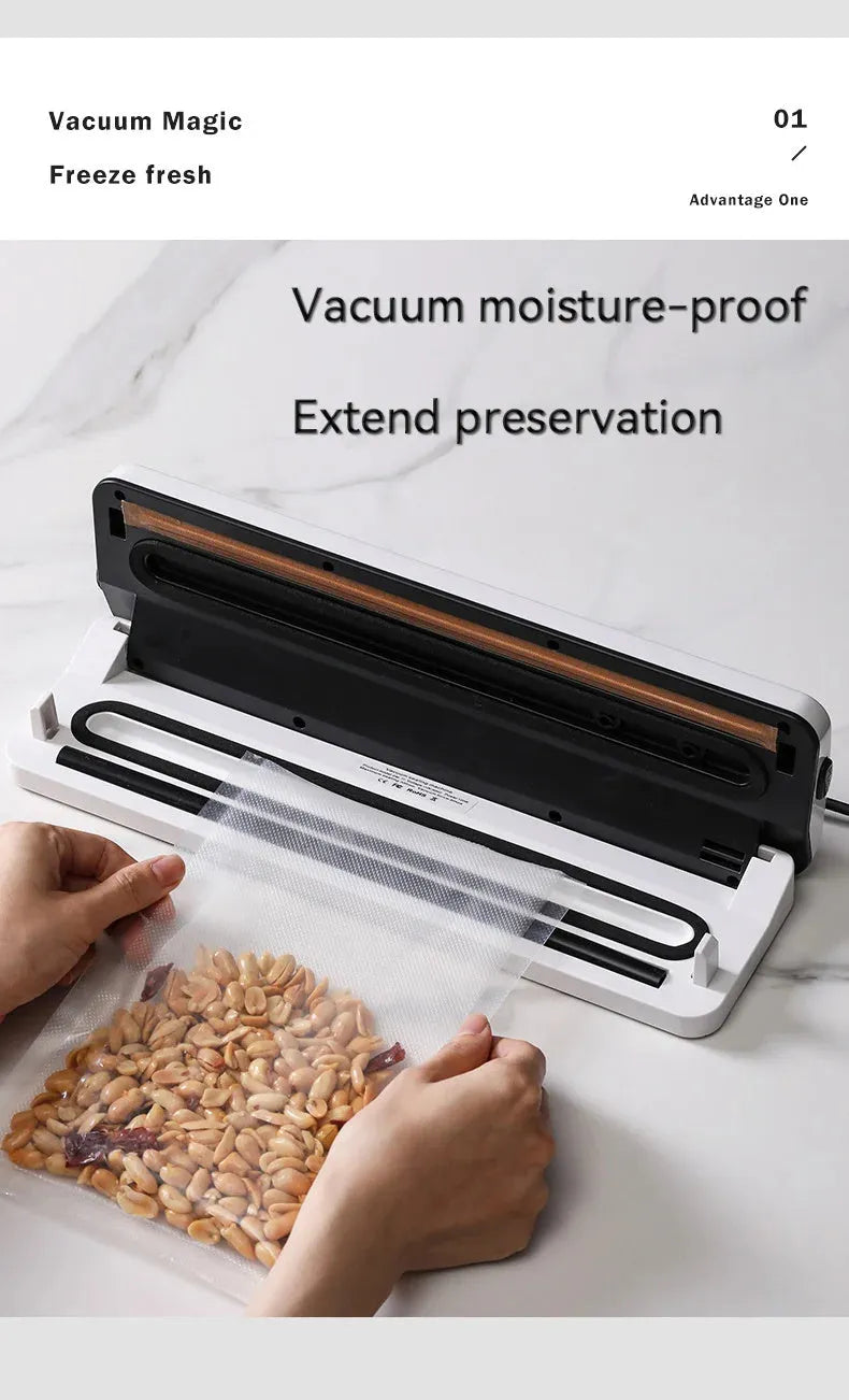 White compact automatic vacuum sealer machine for household food preservation on kitchen counter