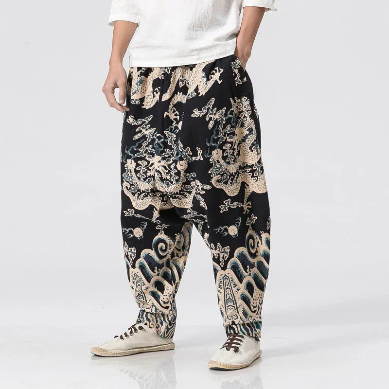 Men's dragon print cross harem trousers with elastic waist and loose leg