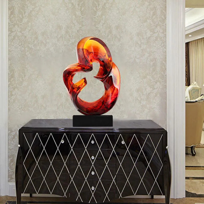 Transparent resin sculpture ornament in modern simplicity style showing orange red or blue colour options