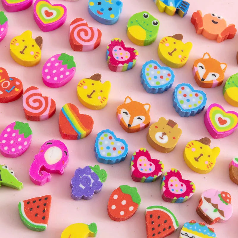 Assortment of 50 colourful cartoon-themed mini erasers including fruit, animal, and holiday designs.