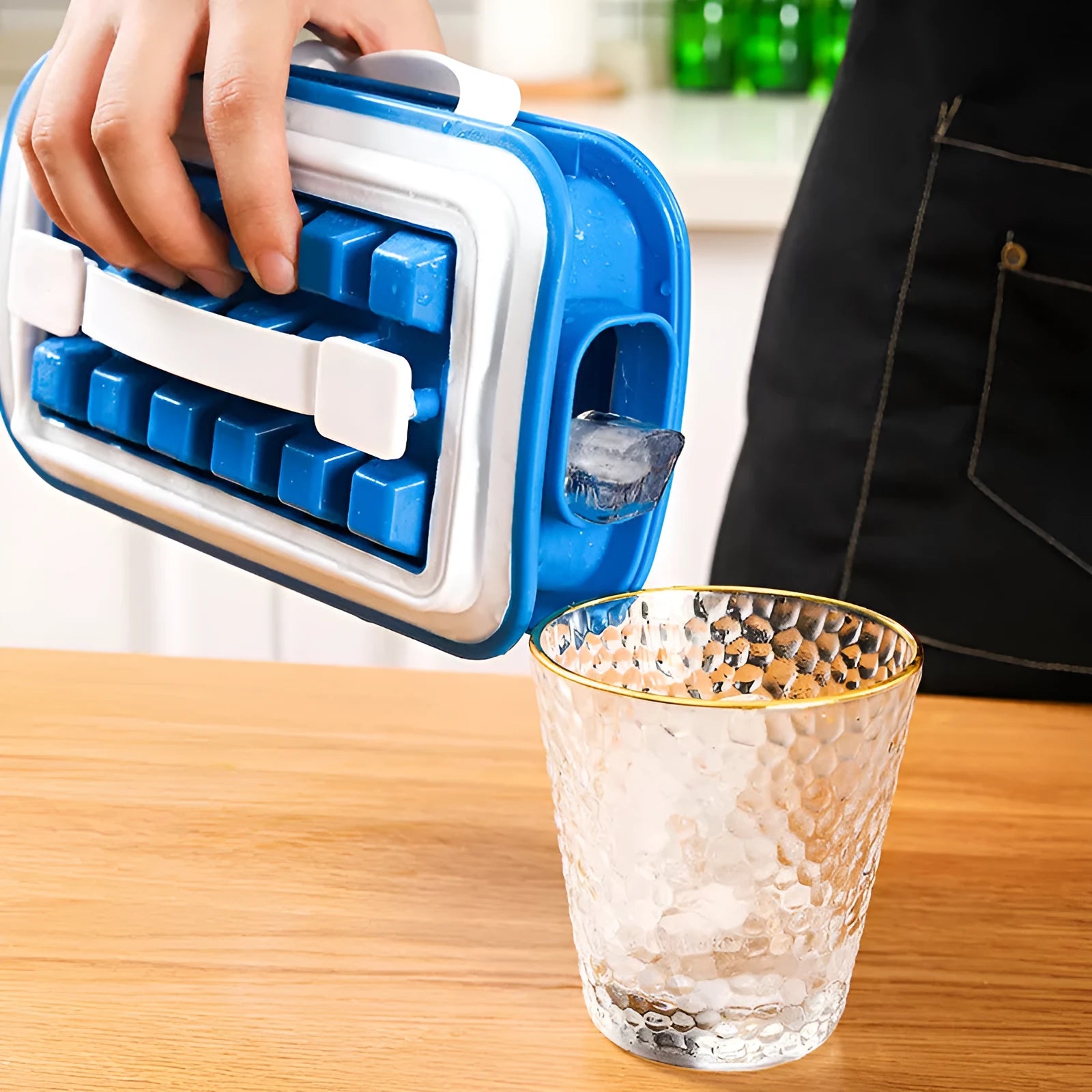 Blue silicone ice cube tray with 36 grid mould and lid on a white surface