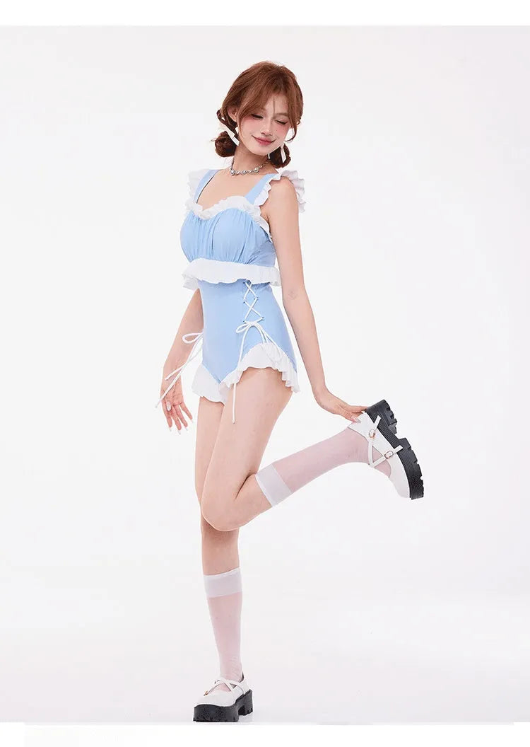 Light blue women's one-piece swimsuit with lace trim and high-waist design