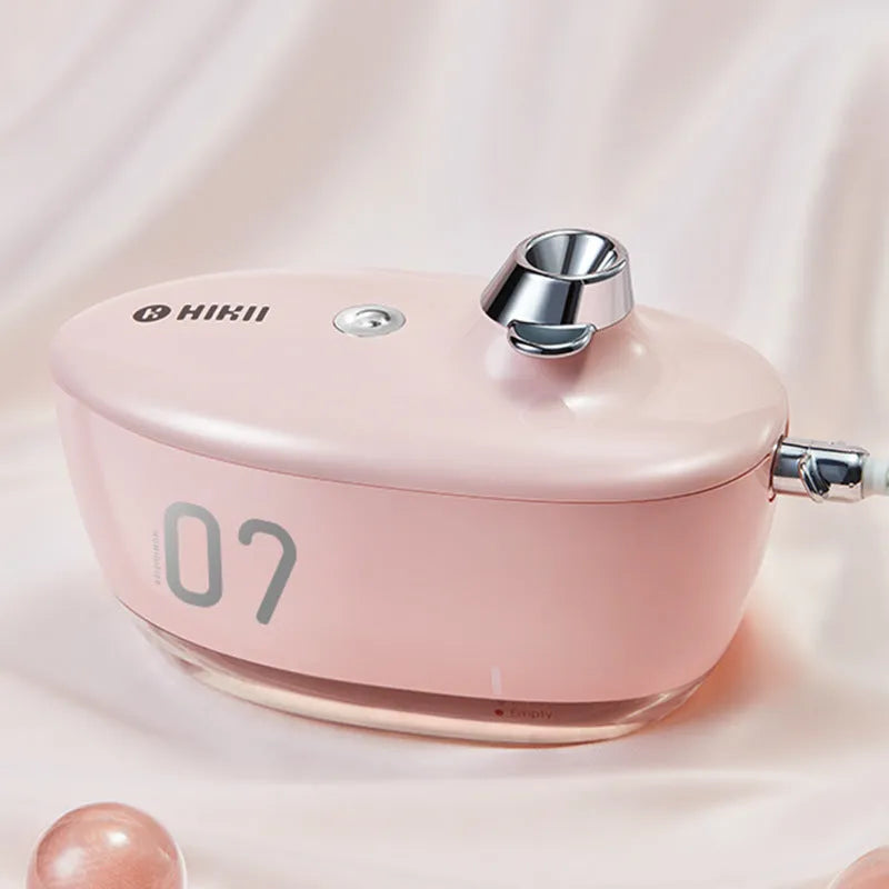 USB small mini portable air purifying humidifier with night light in green, pink, yellow options on desk