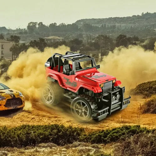 Wrangler Knight remote control off-road car in red on a grass surface with controller