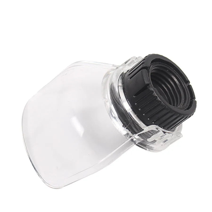 Clear plastic protective face shield for Delta electric grinders on a workbench.