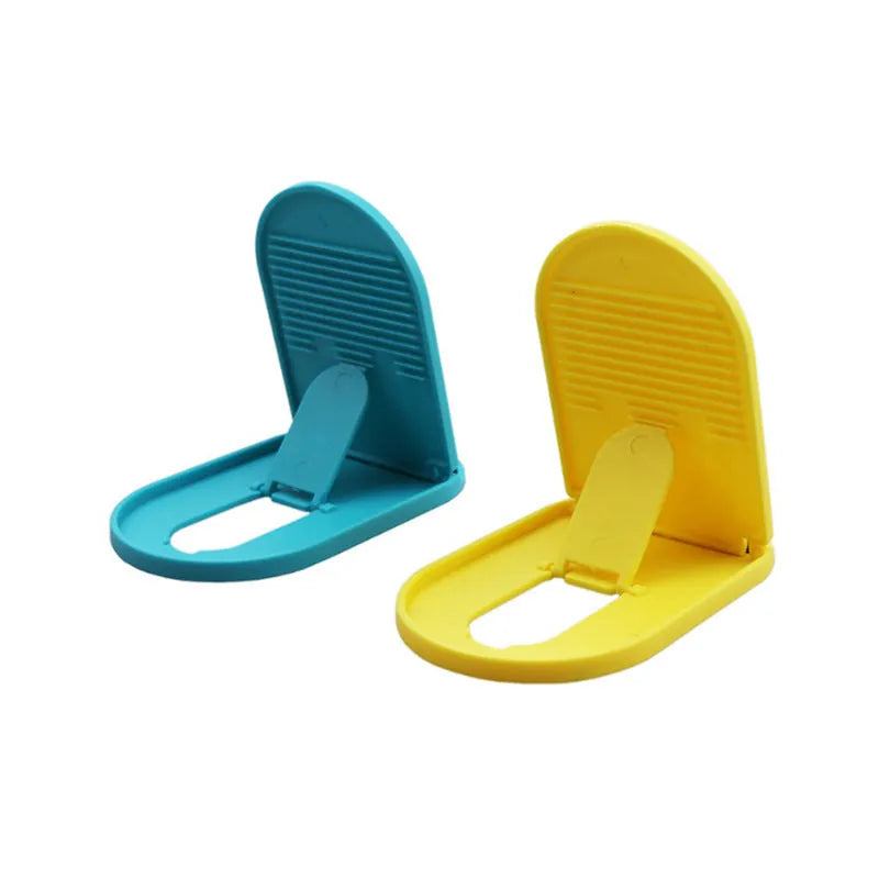 Plastic lazy bracket mobile phone stand in one of six colour options: black, blue, grey, pink, white, or yellow.